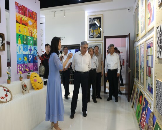 1.2 2025年全国政协副主席 民进中央常务杜主席朱永新来校调研.jpg